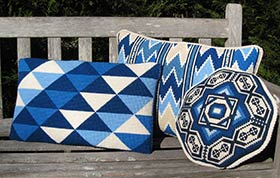 a group of Mediterranian blue pillows